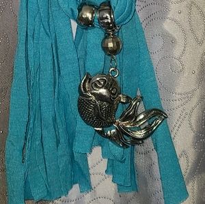 Scarf with pendant